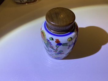 A Chinese doucai bowl, a famille verte spice box and a wucai tea caddy, Kangxi and later